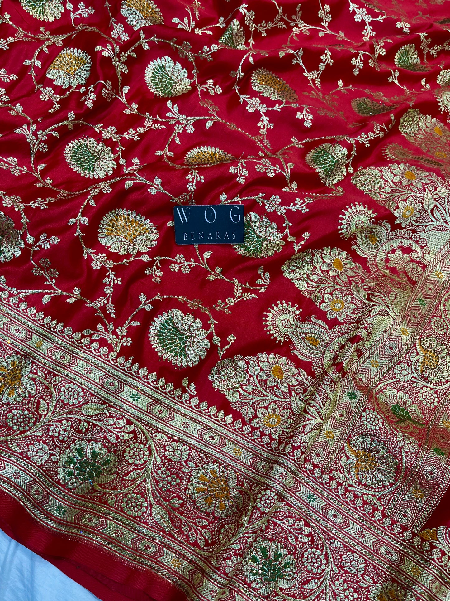 A Bridal Red Banarasi Meenakari jall with Handwork