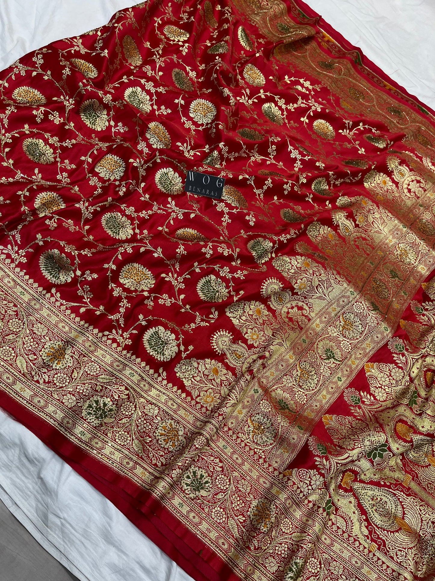 A Bridal Red Banarasi Meenakari jall with Handwork