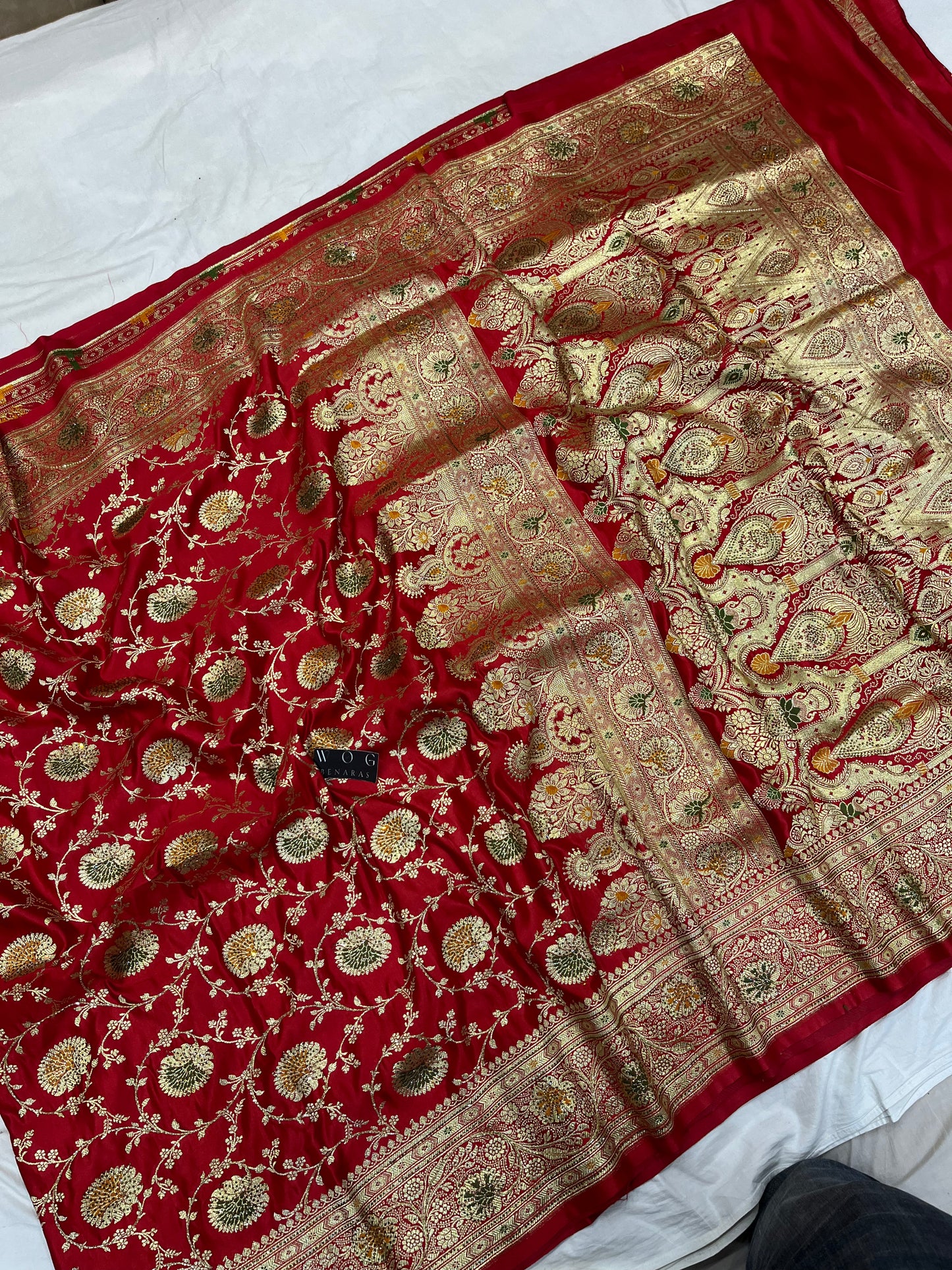A Bridal Red Banarasi Meenakari jall with Handwork