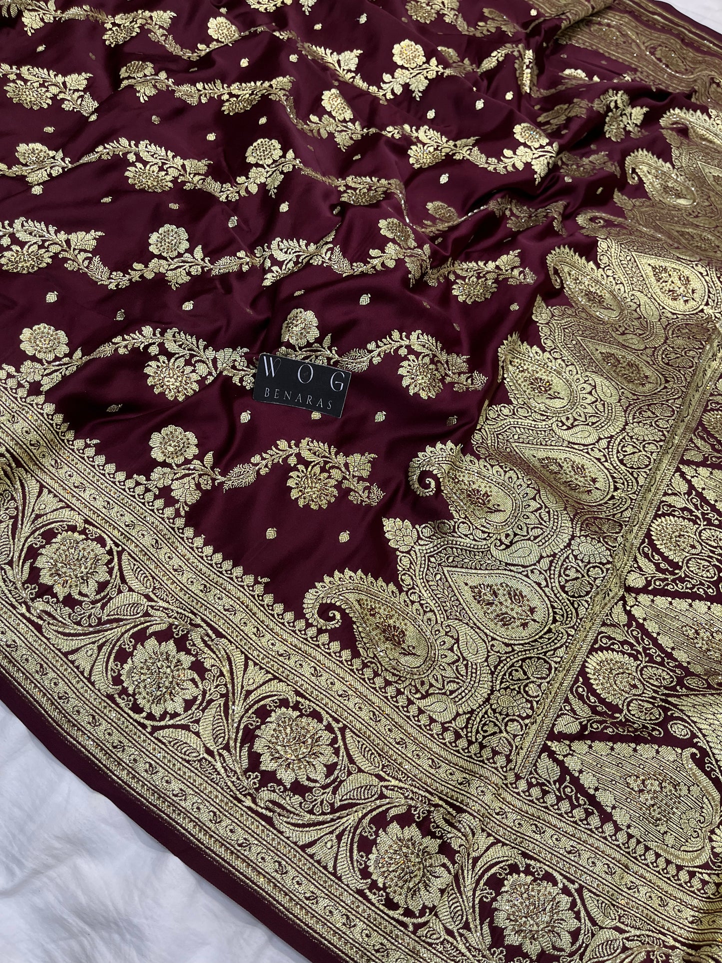 A Bridal Garnet Banarasi Ada saree with Handwork