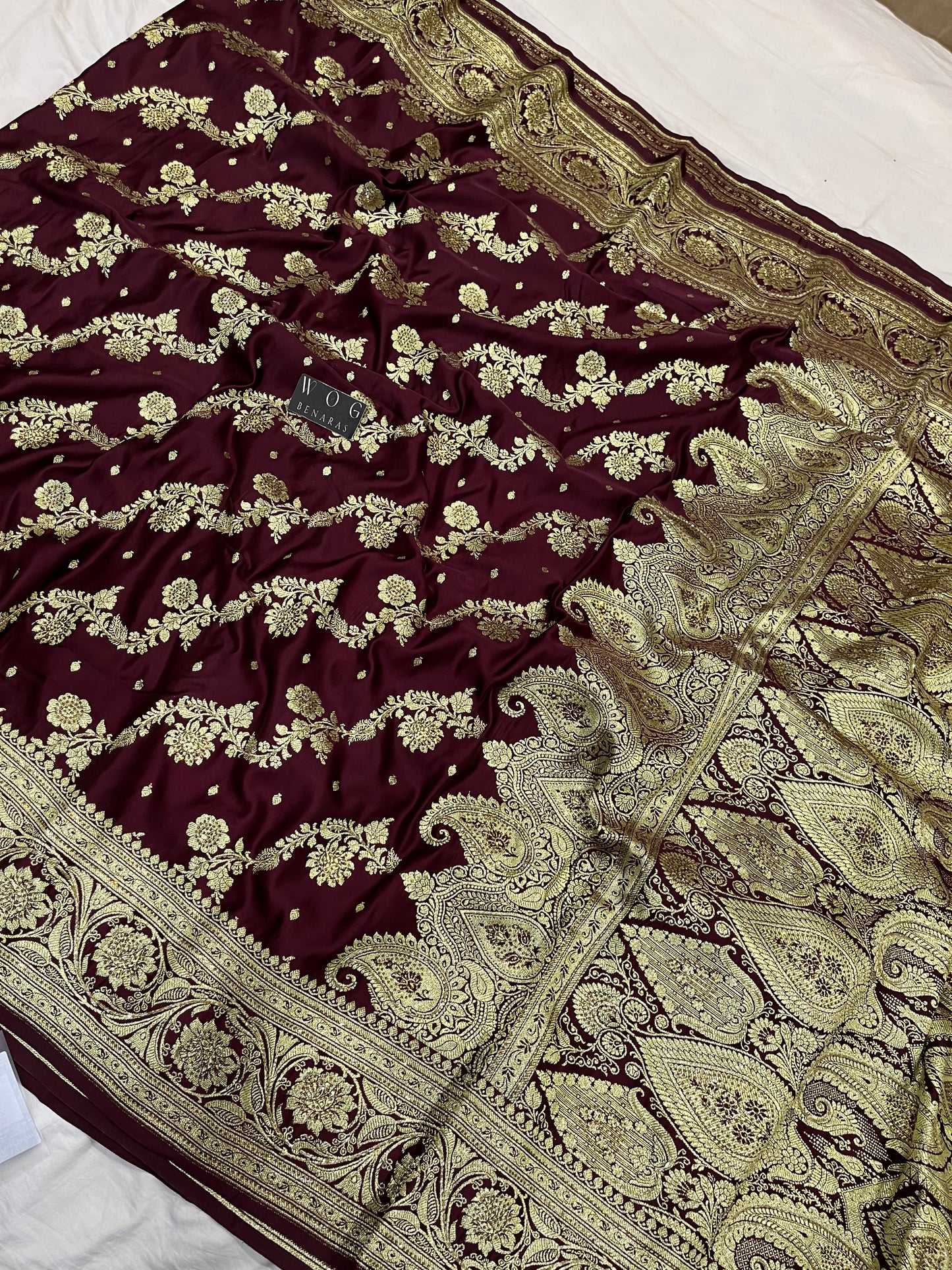 A Bridal Garnet Banarasi Ada saree with Handwork