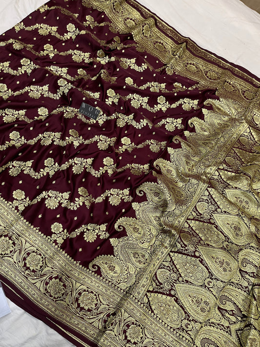 A Bridal Garnet Banarasi Ada saree with Handwork