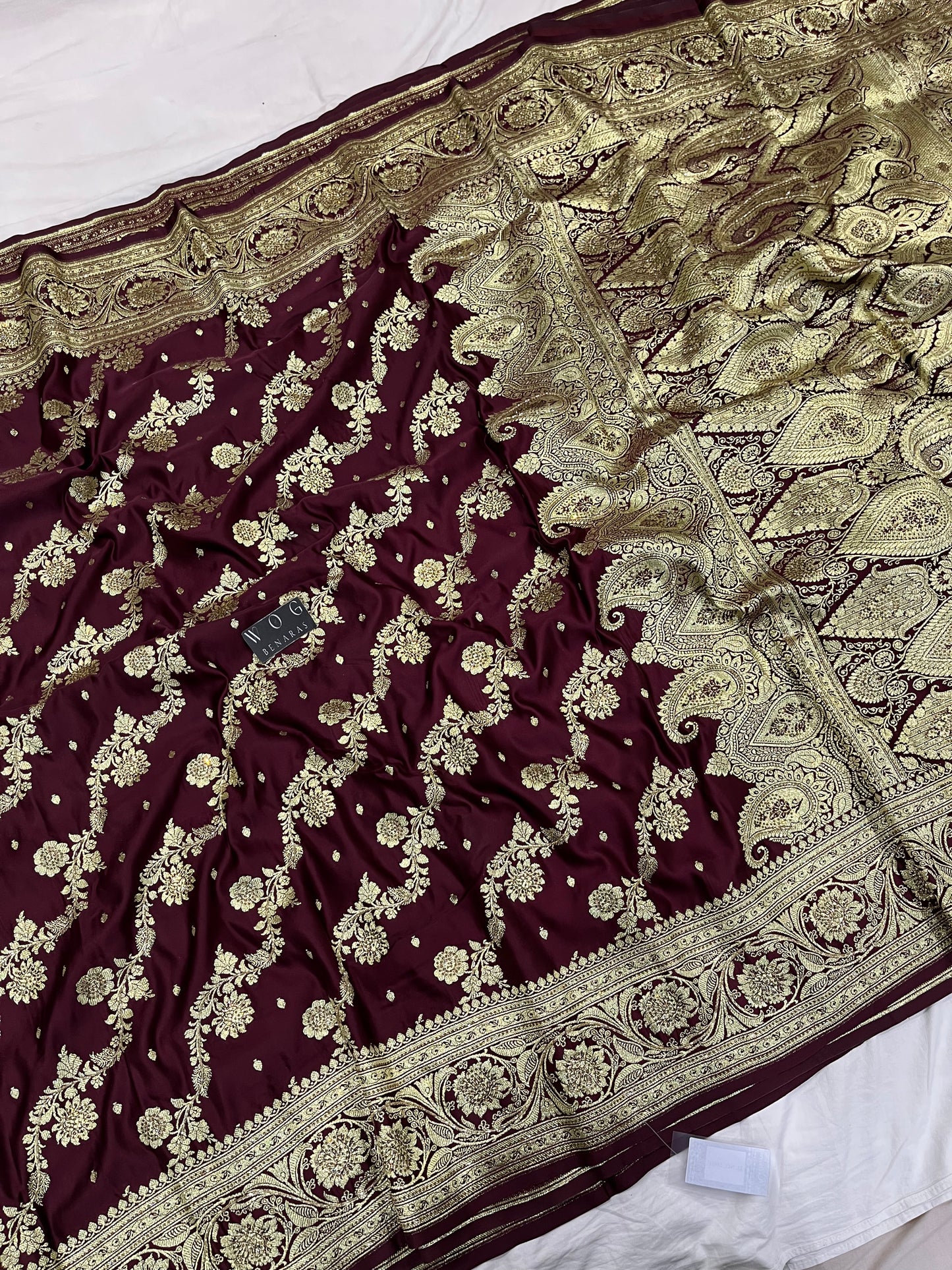 A Bridal Garnet Banarasi Ada saree with Handwork