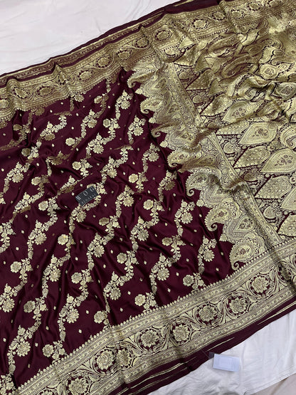A Bridal Garnet Banarasi Ada saree with Handwork